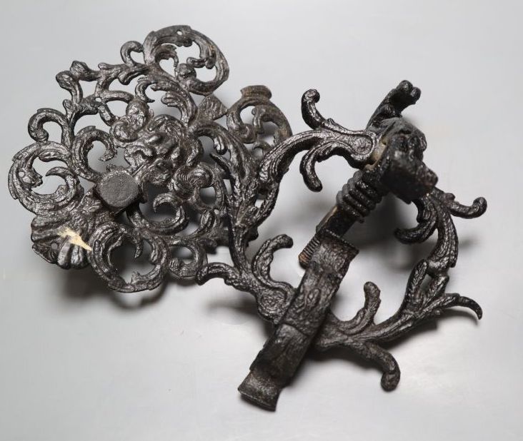 An 18th century elaborate cast iron door knocker, and back plate, 22cm
